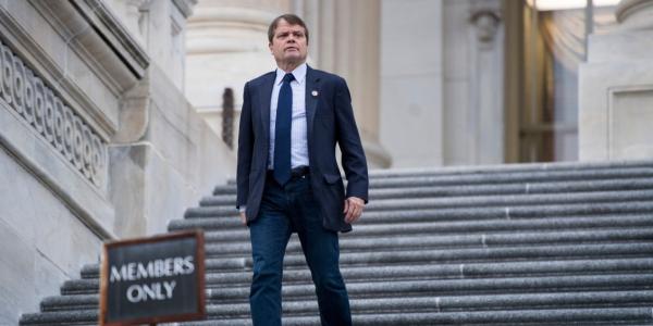 Mike Quigley comes down the steps of the US Capitol