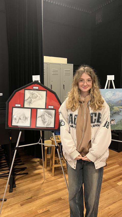 Polina Popandopulo, winner of the 2024 Congressional Art Competition winner, with her piece, “Best Buddies Down on the Farm”