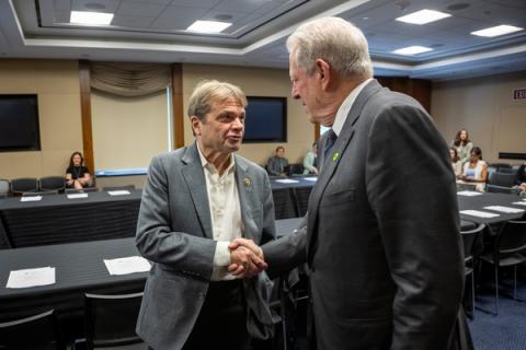 Quigley shakes hands with Vice President Al Gore