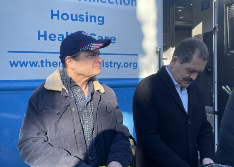 Representatives Quigley and Chuy Garcia help distribute food with The Night Ministry