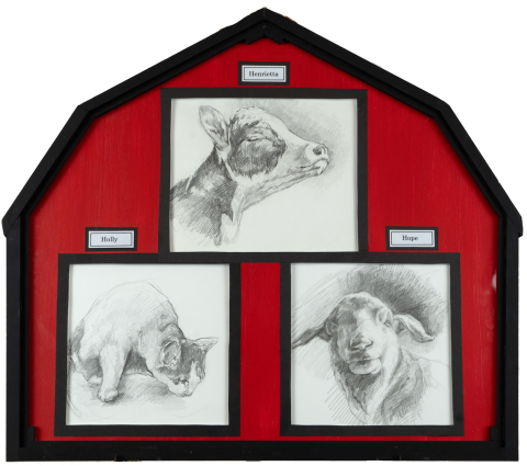 a black picture frame in the shape of a barn with a red background and three pencil sketches within of a cow, a cat, and a sheep.
