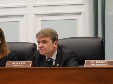 Rep Quigley speaking from a dais during an appropriations subcommittee hearing