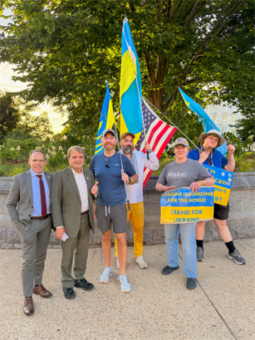 Mike Quigley with Ukraine flags and supporters
