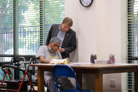 Quigley with senior citizen